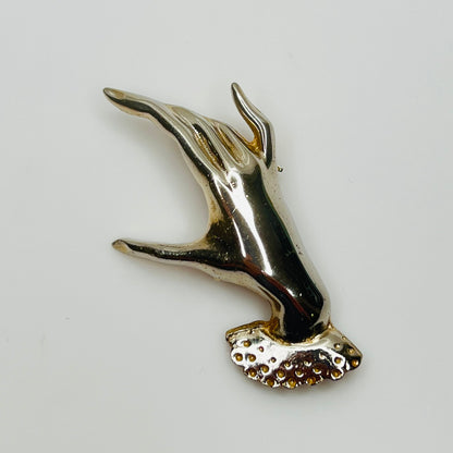 1950s silver tone sculptural hand brooch