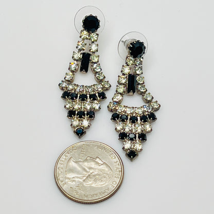 Art Deco-style earrings with black and clear rhinestones in a long silver-tone design