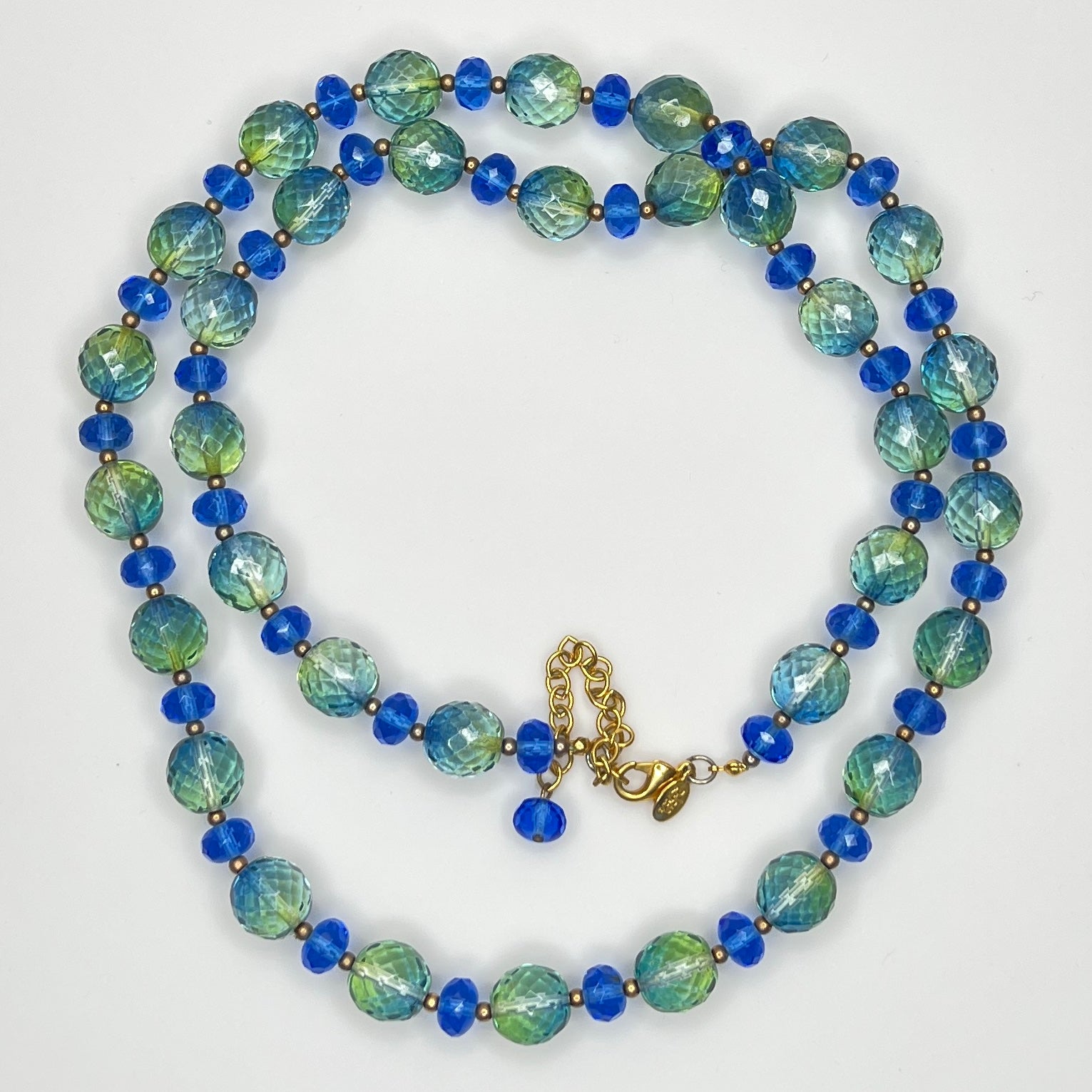 Coiled Joan Rivers necklace with gold-tone extender and clasp visible