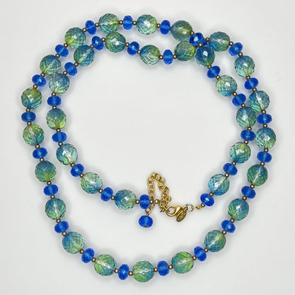 Coiled Joan Rivers necklace with gold-tone extender and clasp visible