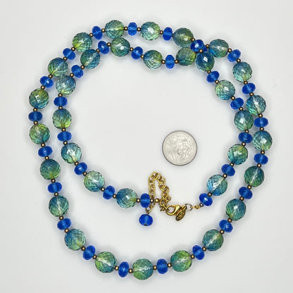 Coiled Joan Rivers necklace with gold-tone extender and clasp visible