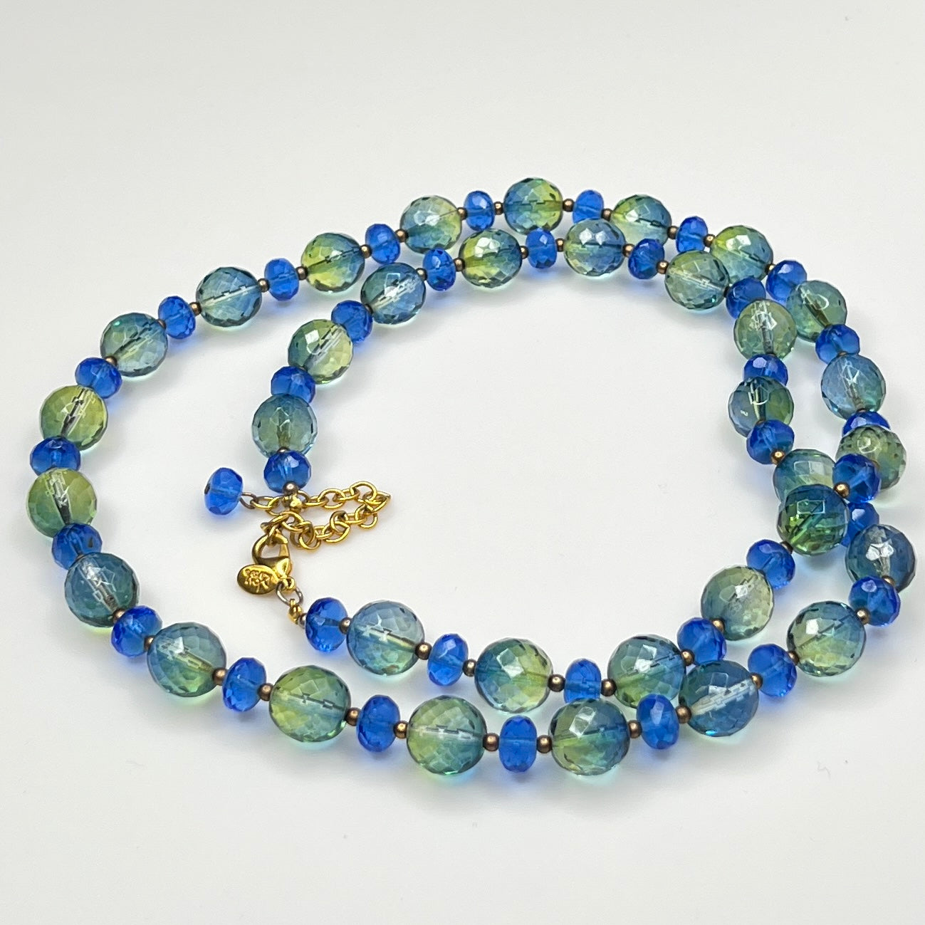 Coiled Joan Rivers necklace with gold-tone extender and clasp visible