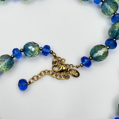 Coiled Joan Rivers necklace with gold-tone extender and clasp visible