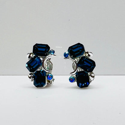 Lisner clip-on earrings with sapphire blue rhinestones and silver-tone setting