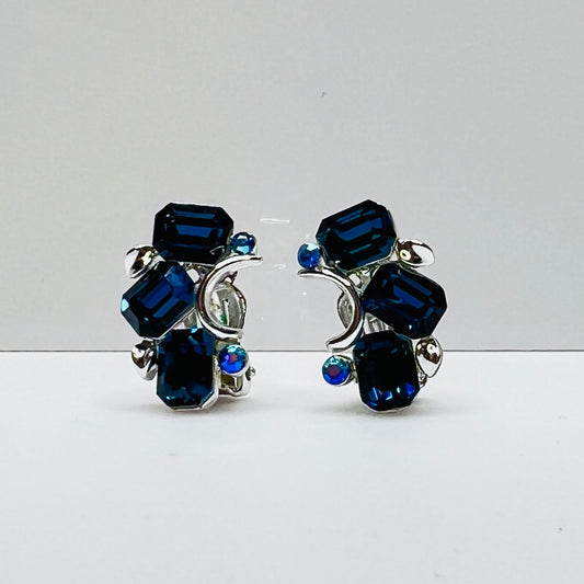 Lisner clip-on earrings with sapphire blue rhinestones and silver-tone setting