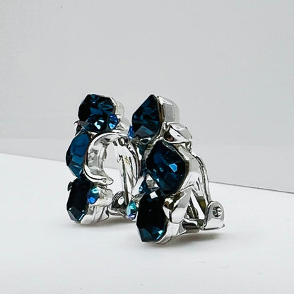 Lisner clip-on earrings with sapphire blue rhinestones and silver-tone setting