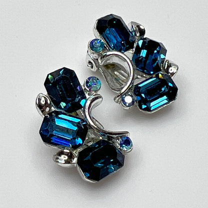 Lisner clip-on earrings with sapphire blue rhinestones and silver-tone setting