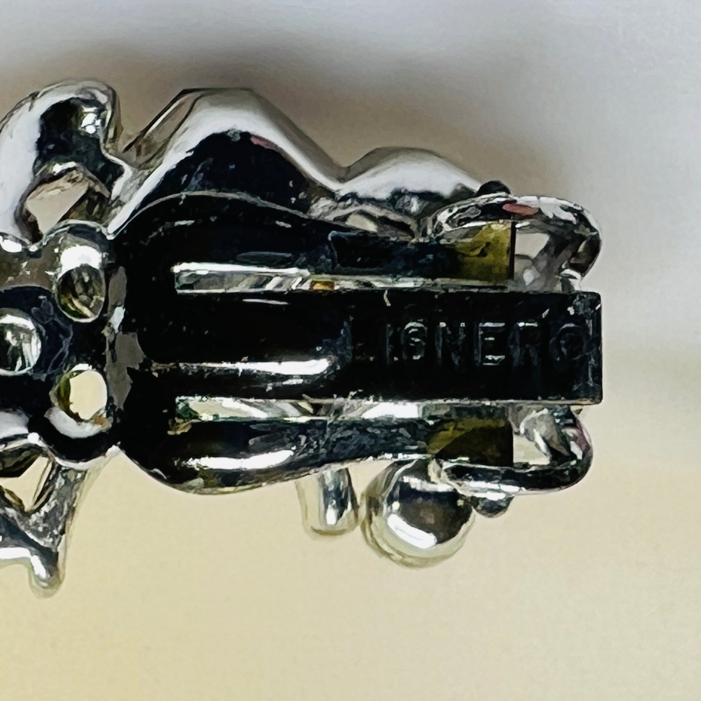 Lisner clip-on earrings with sapphire blue rhinestones and silver-tone setting