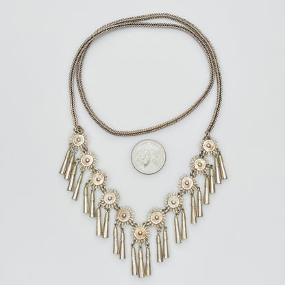 Vintage Miao Hmong silver tribal tassel necklace on display