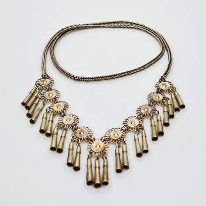 Vintage Miao Hmong silver tribal tassel necklace on display