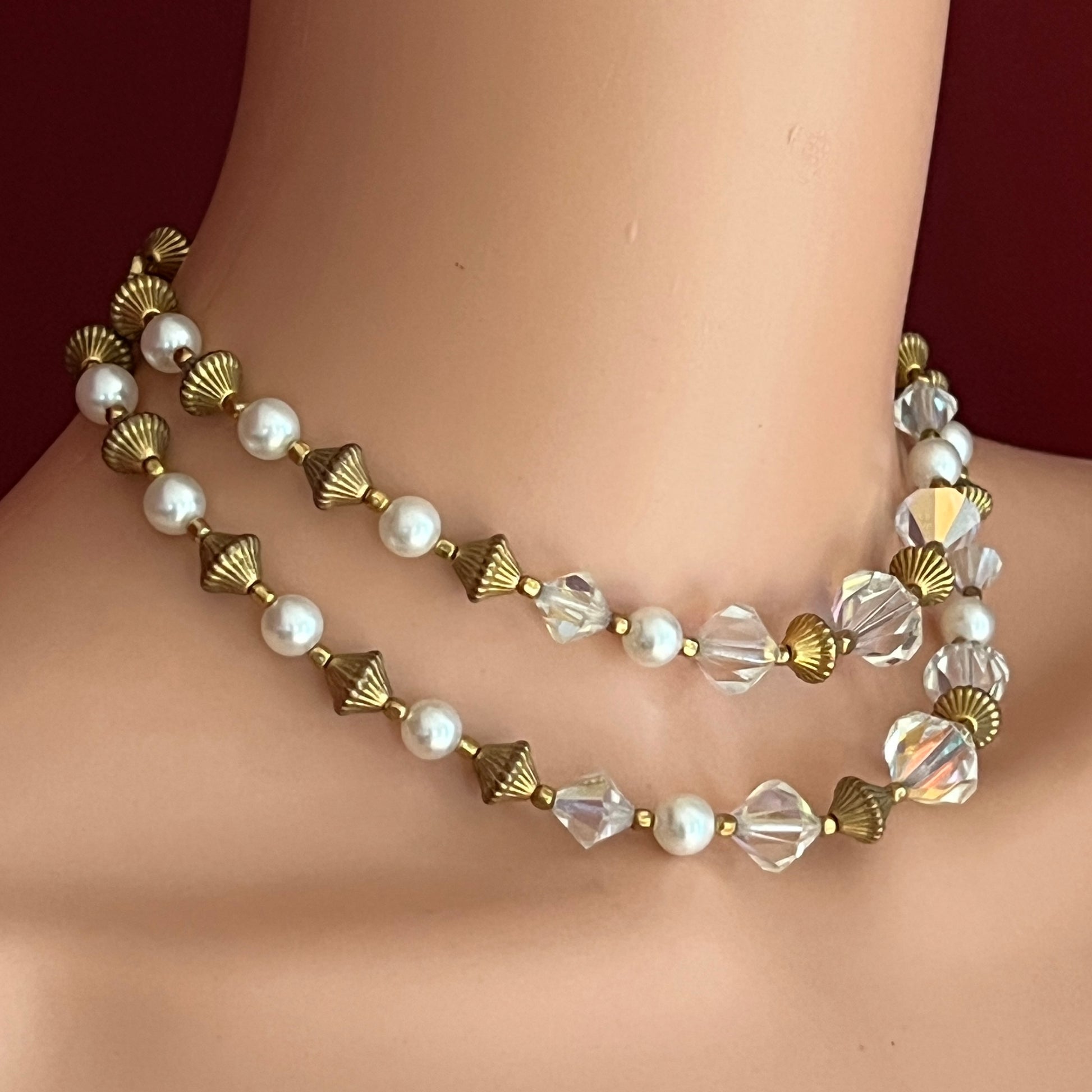 Mid-century layered necklace with aurora borealis crystals and pearls on mannequin