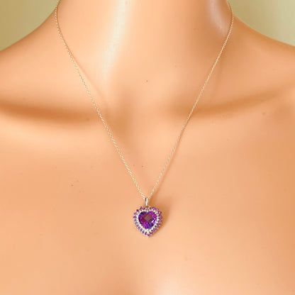 Vintage purple heart pendant necklace worn on mannequin