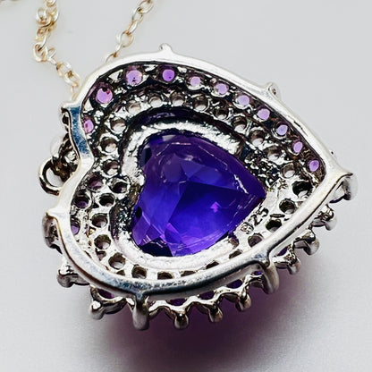 Back of pendant showing sterling silver setting and stones