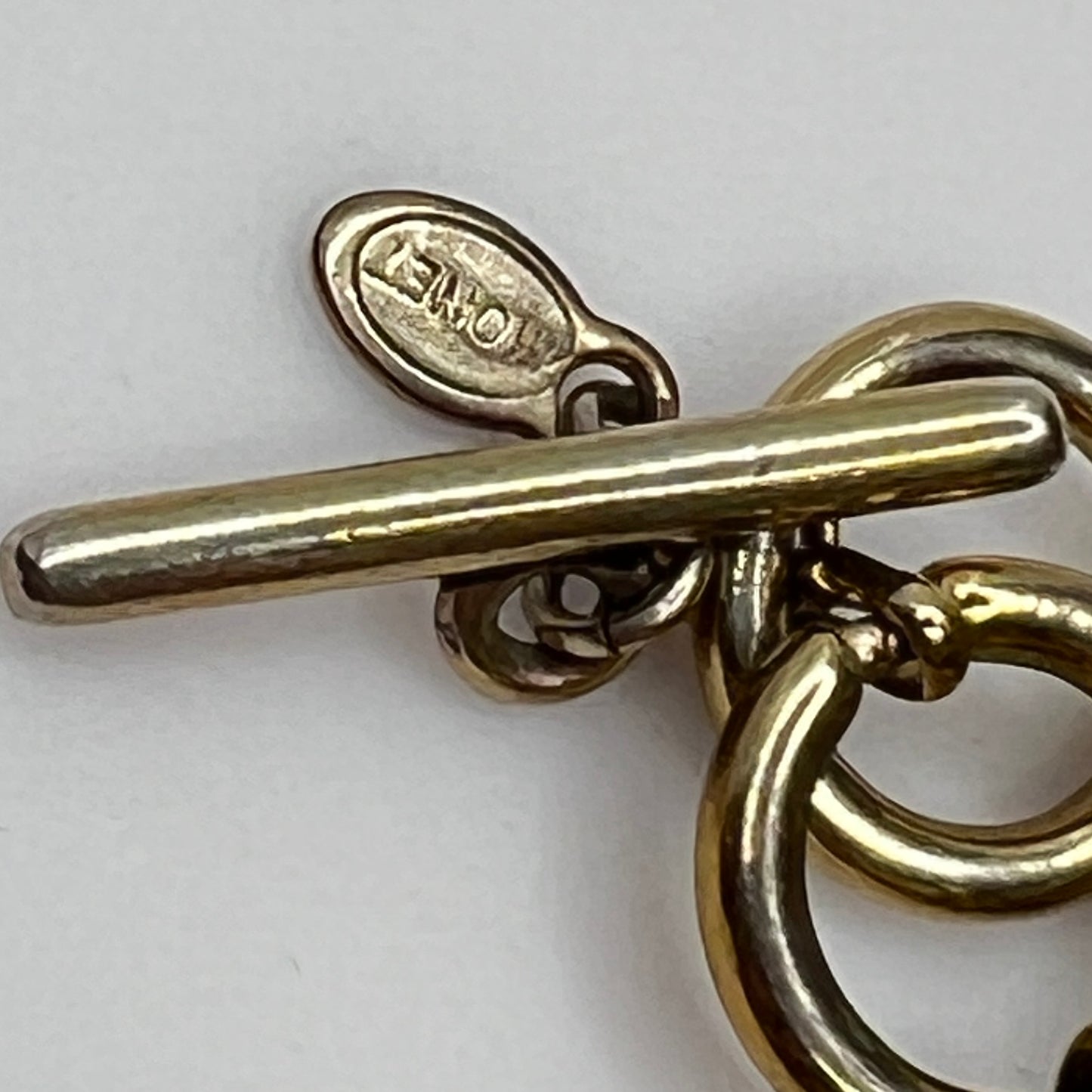 Vintage Monet necklace with green and yellow glass cabochons in gold-tone setting