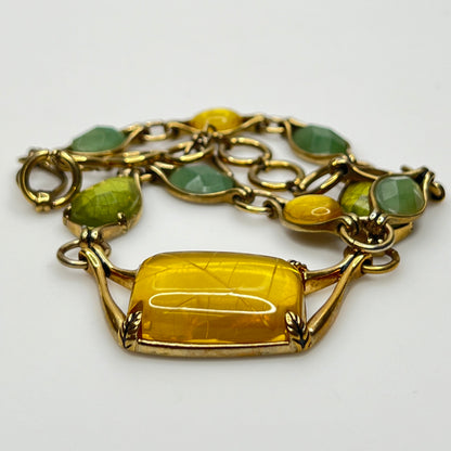 Vintage Monet necklace with green and yellow glass cabochons in gold-tone setting