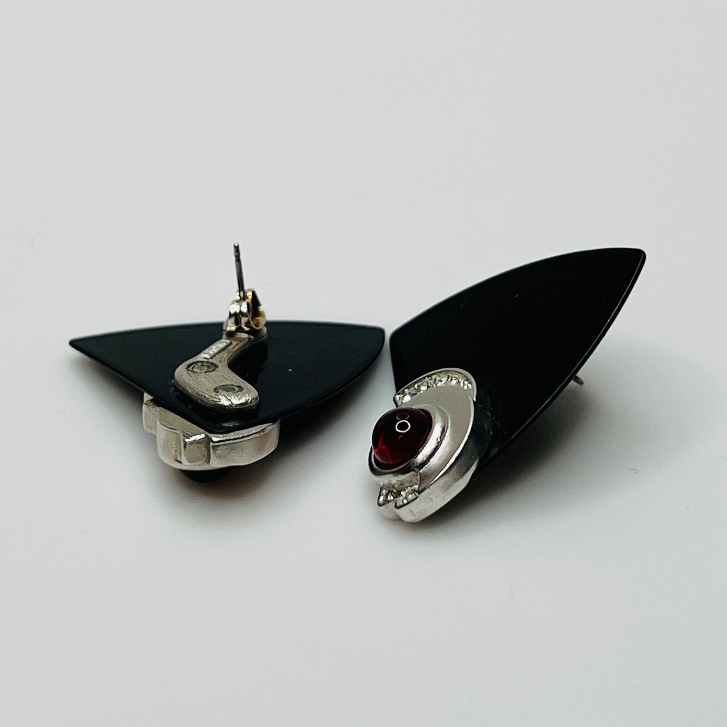 Pair of black triangular Monet earrings with red glass cabochon and rhinestones