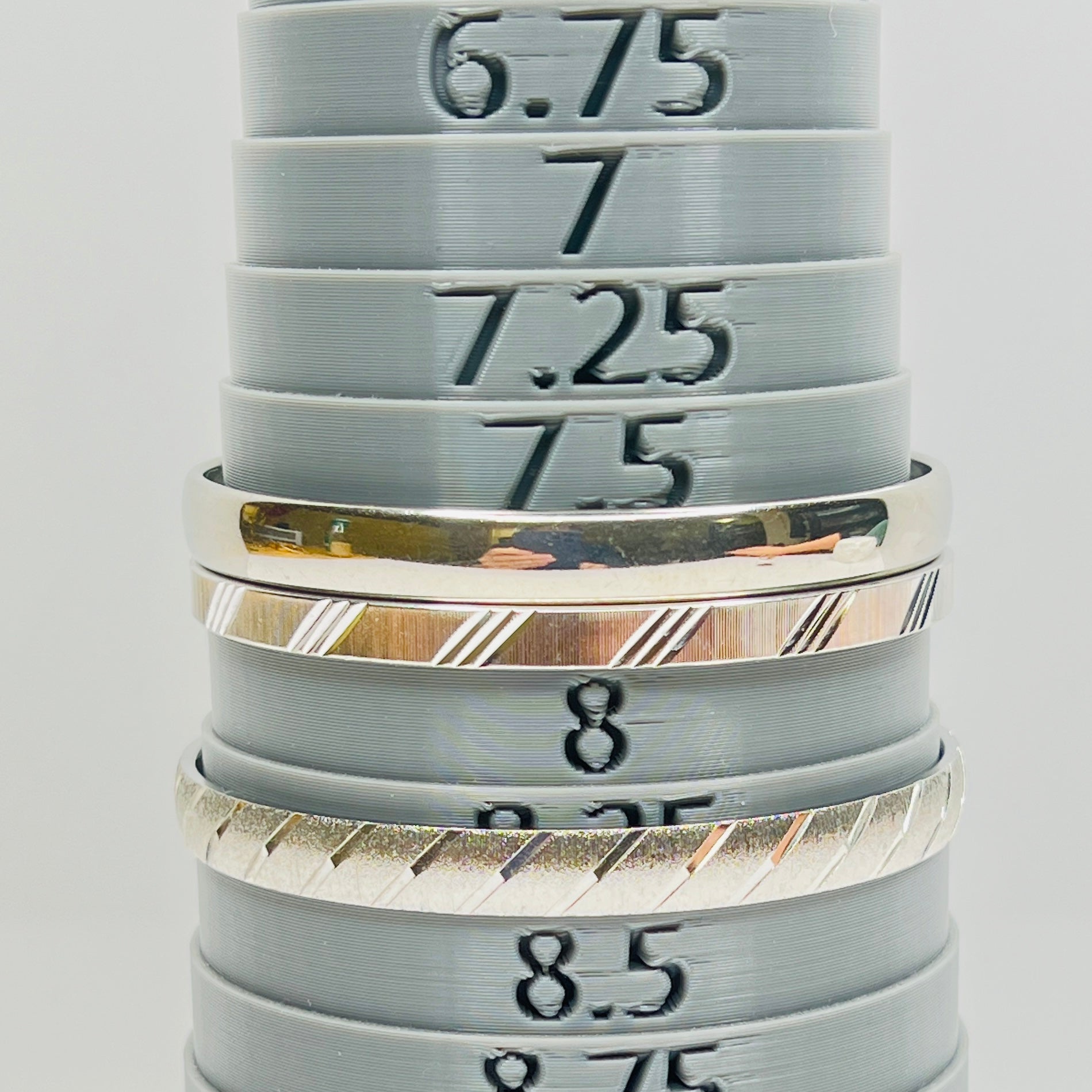 Monet silver tone bangle set with etched diagonal pattern
