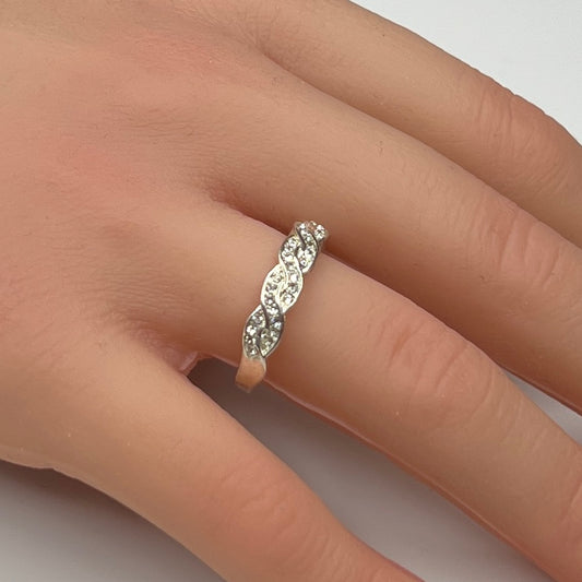 Braided crystal band ring shown on hand, size 7.5