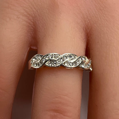 Braided crystal band ring shown on hand, size 7.5