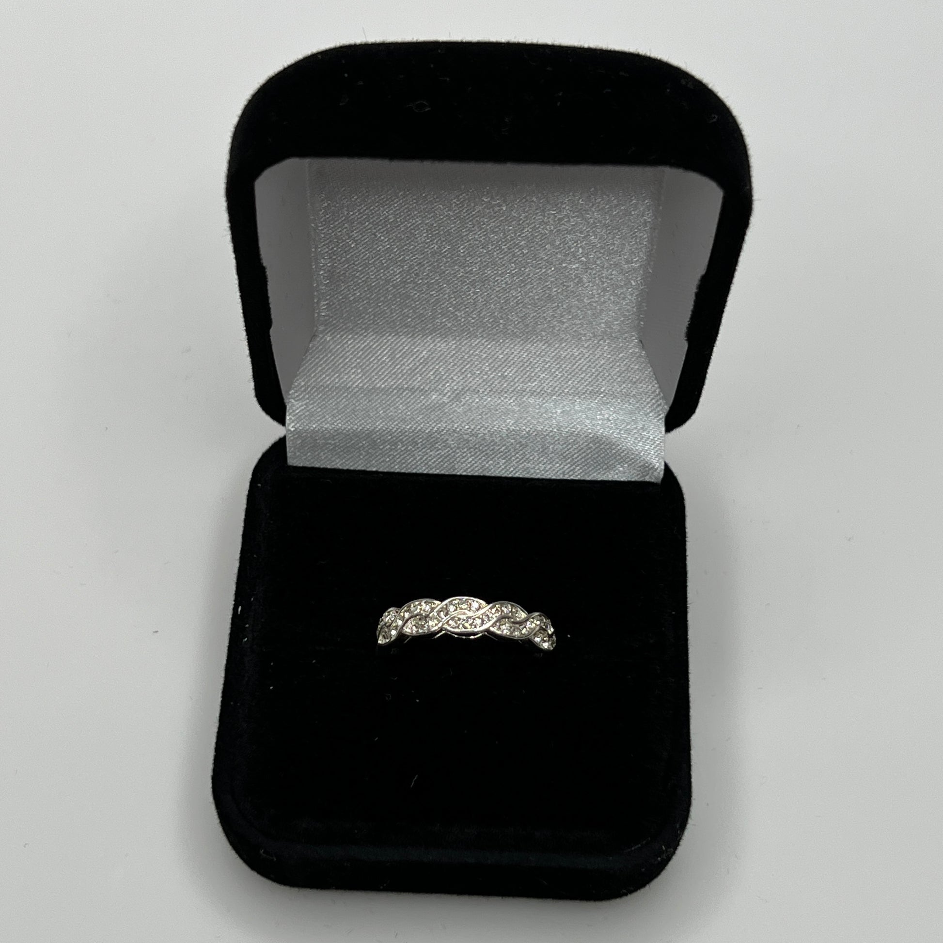 Sterling silver braided eternity ring in black velvet box