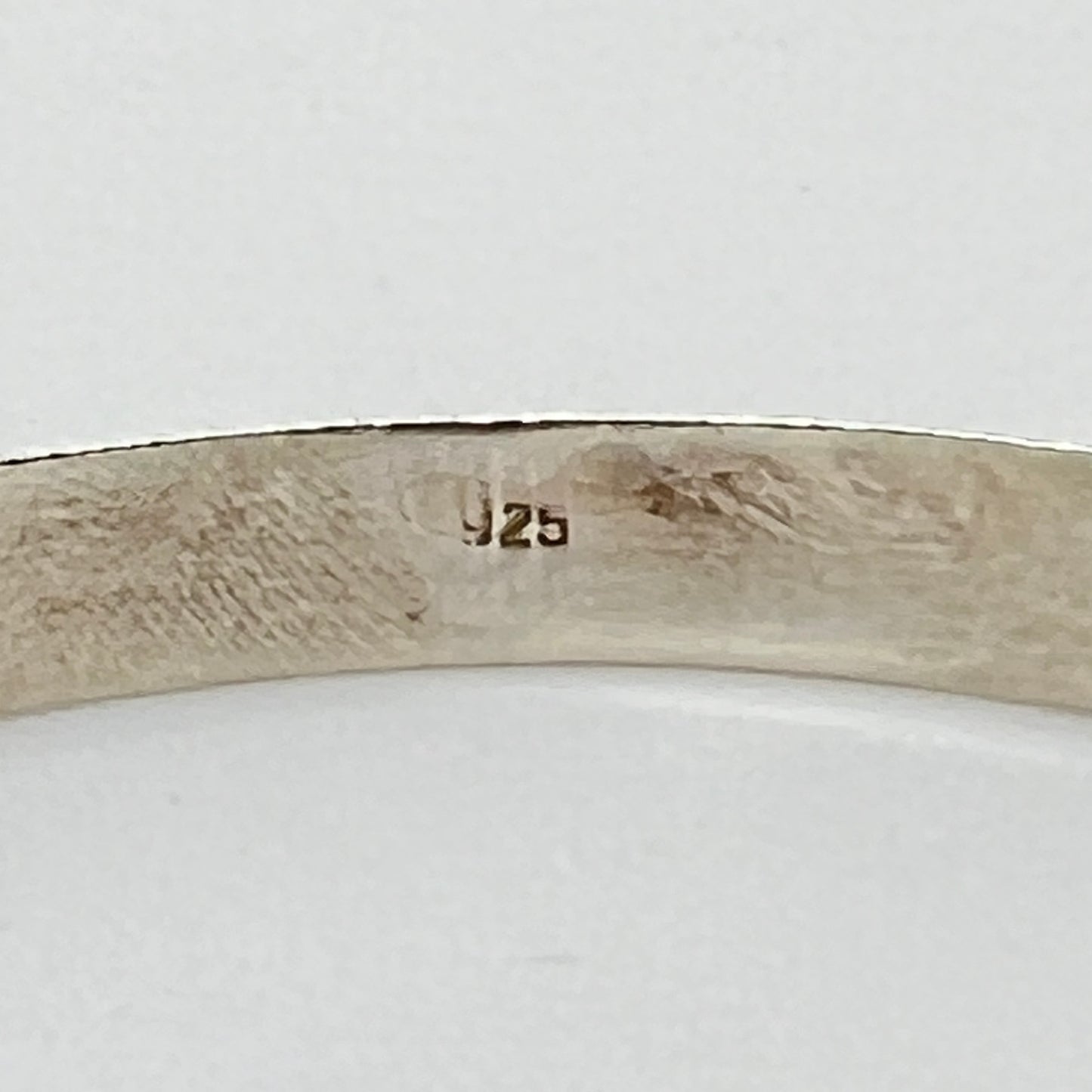 Interior close-up showing 925 sterling silver stamp