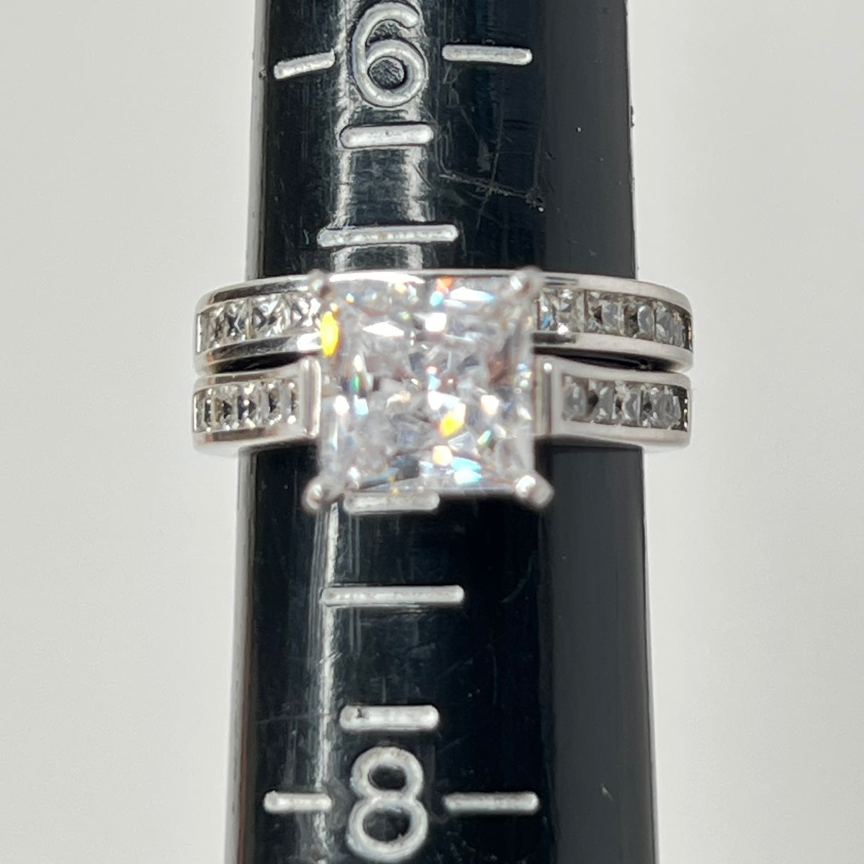 Sterling silver bridal set on a ring sizer