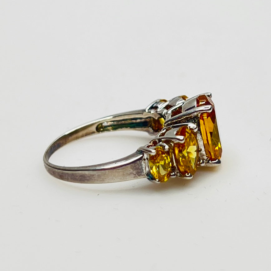 Side profile showing stone height and prong details