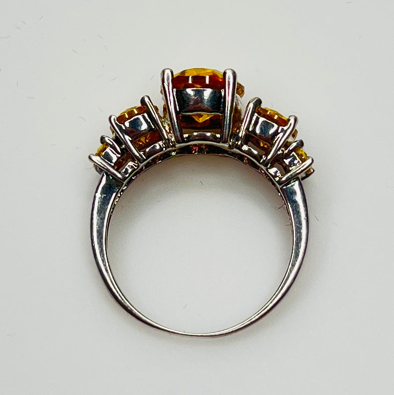 Side profile showing stone height and prong details