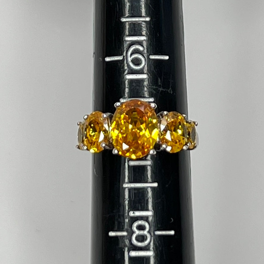 Ring positioned on a mandrel, showing size 6.75 clearly