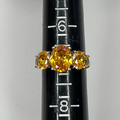 Ring positioned on a mandrel, showing size 6.75 clearly