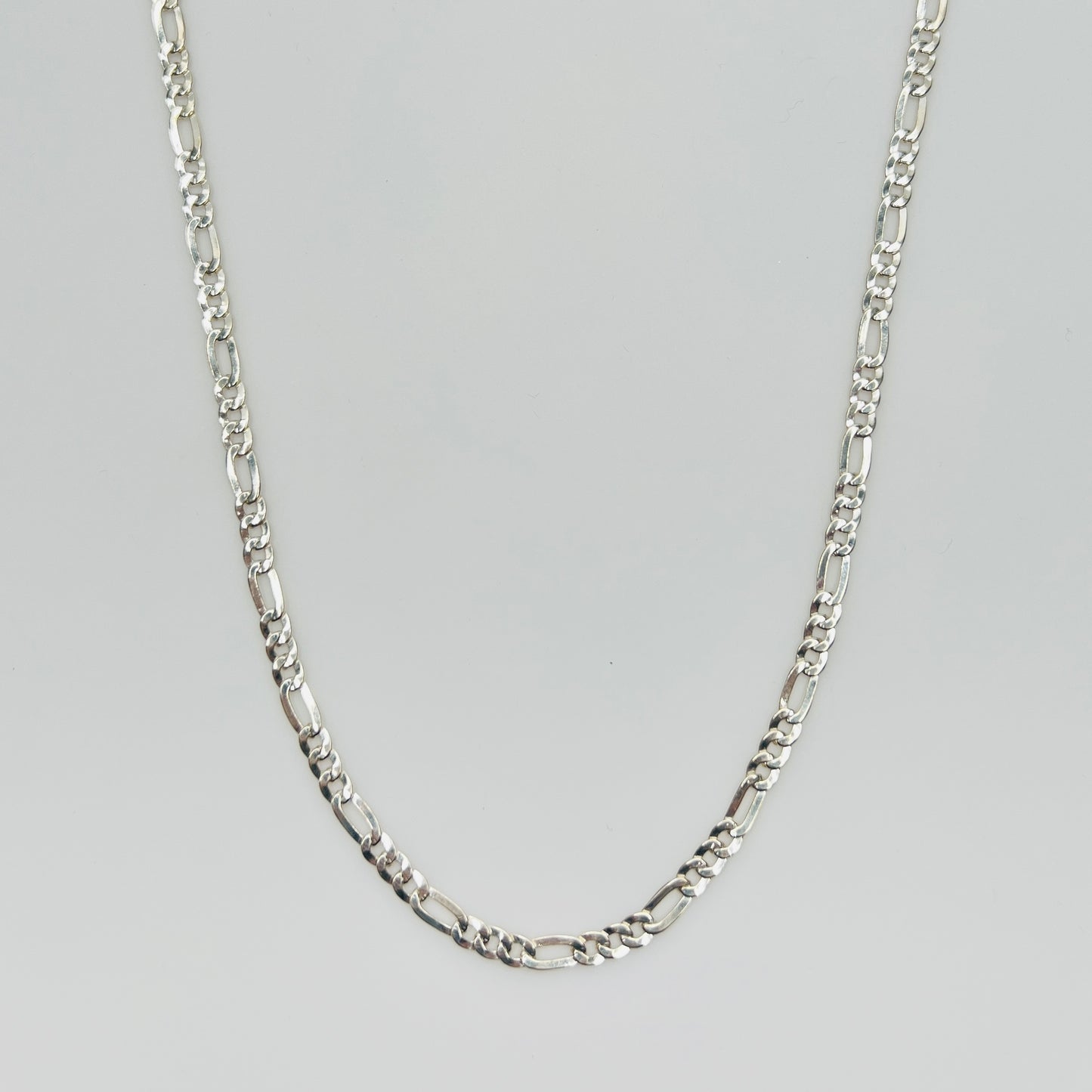 Sterling silver Figaro chain necklace with polished finish