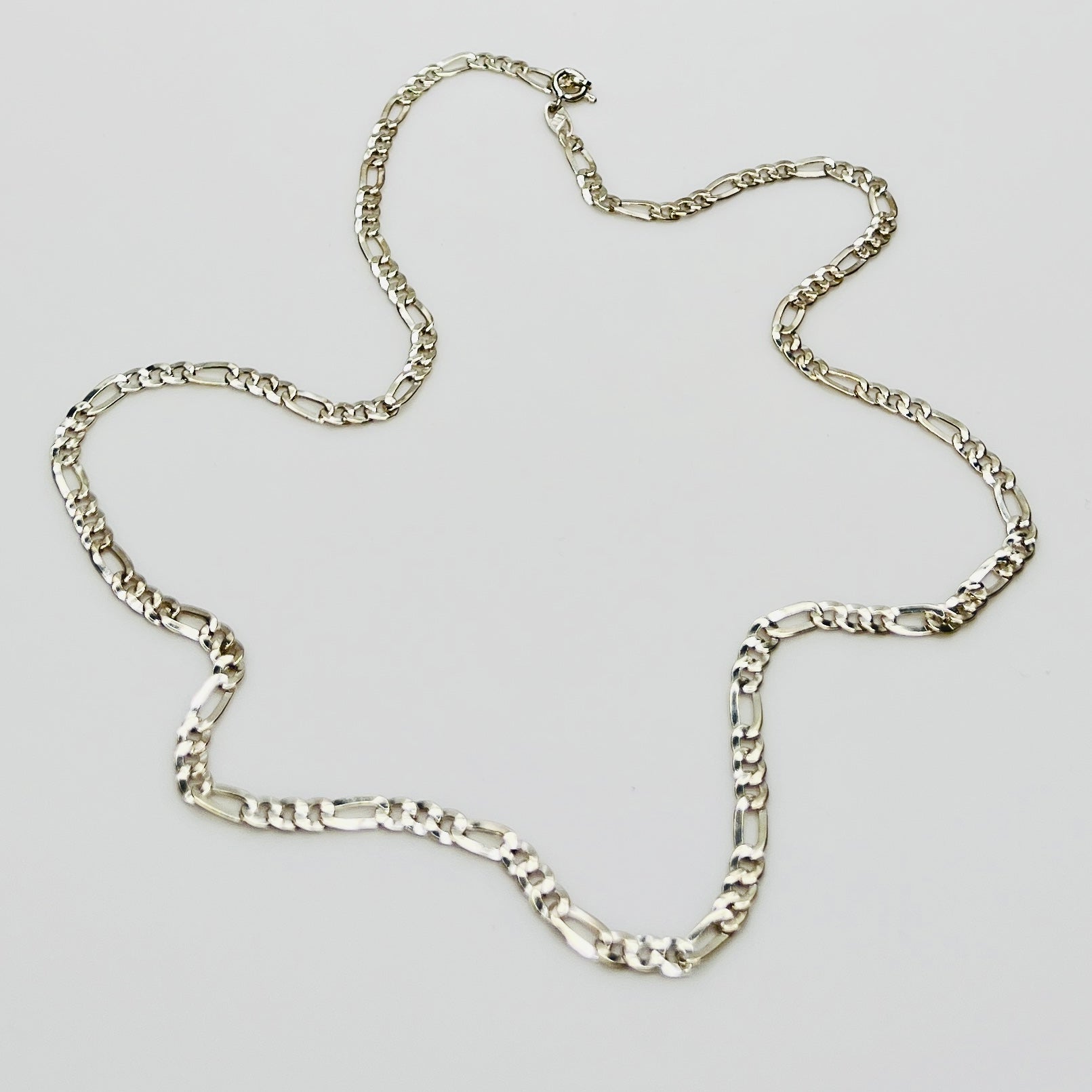 Sterling silver Figaro chain necklace with polished finish