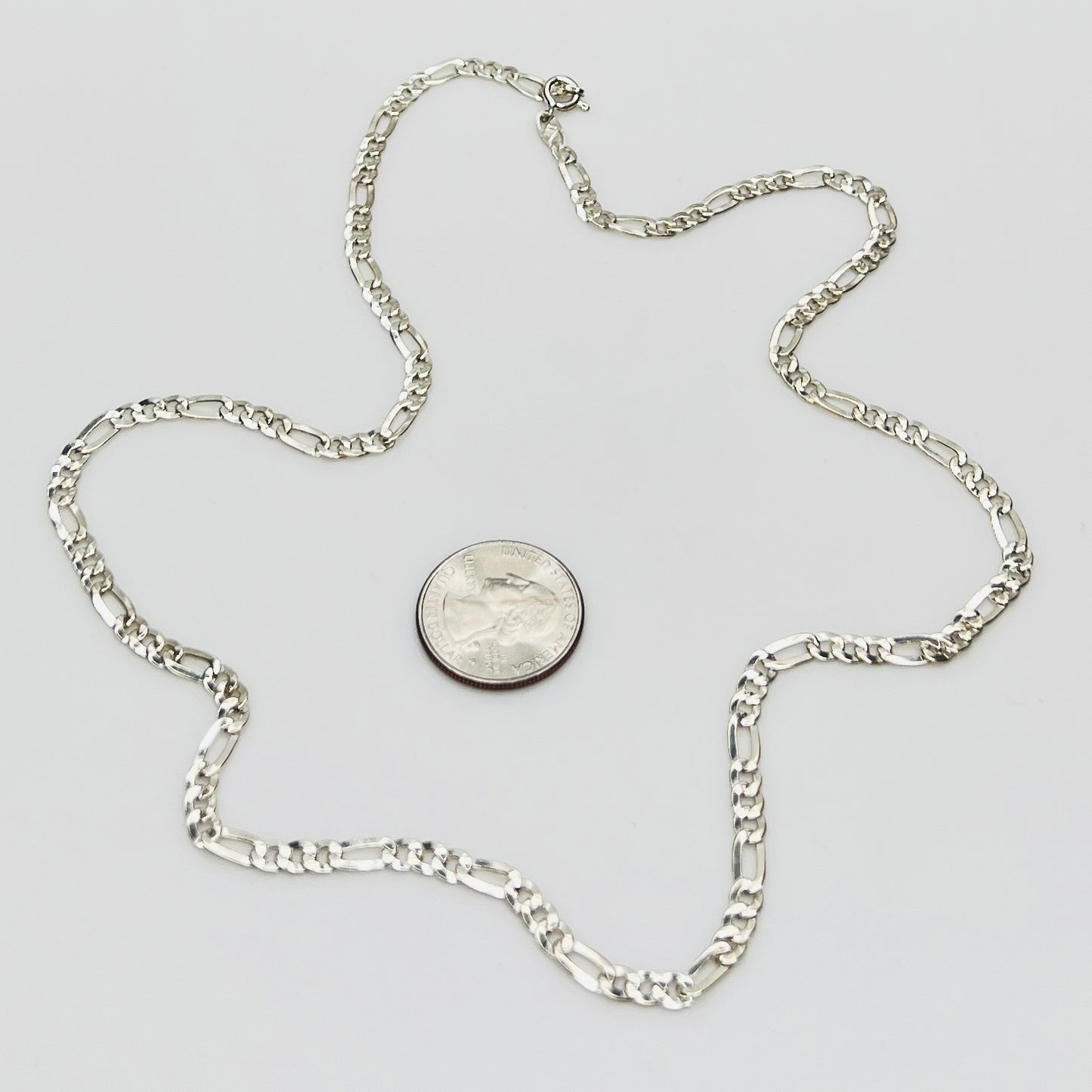 Sterling silver Figaro chain necklace with polished finish