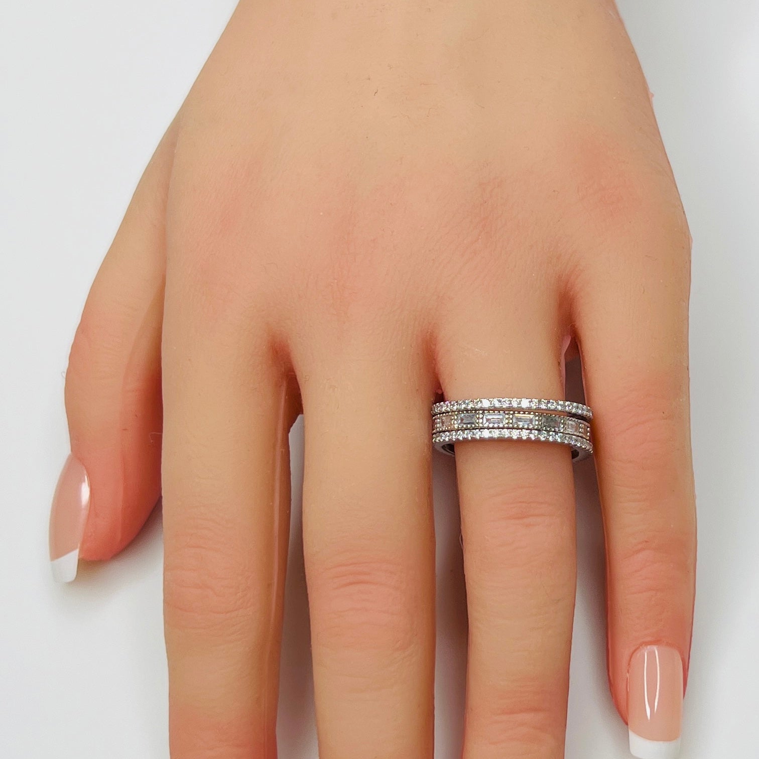 Sterling silver crystal ring trio stacked on hand