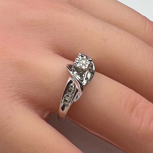 Sterling silver diamond ring by Forever Bride shown on finger