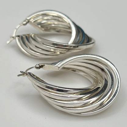 Side angle showing curved sterling hoop earring shape