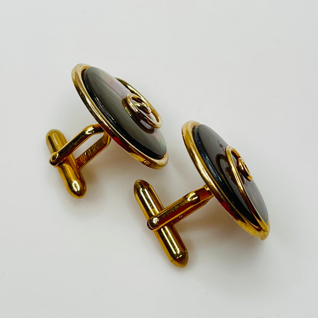 Round abalone cufflinks with gold swirl overlay, iridescent finish, 1960s Swank design