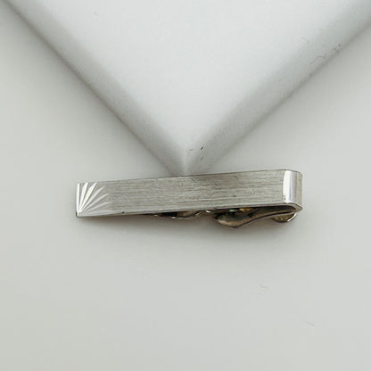 Brushed silver-tone Swank tie clip with etched fanburst detail, Mid-Century style