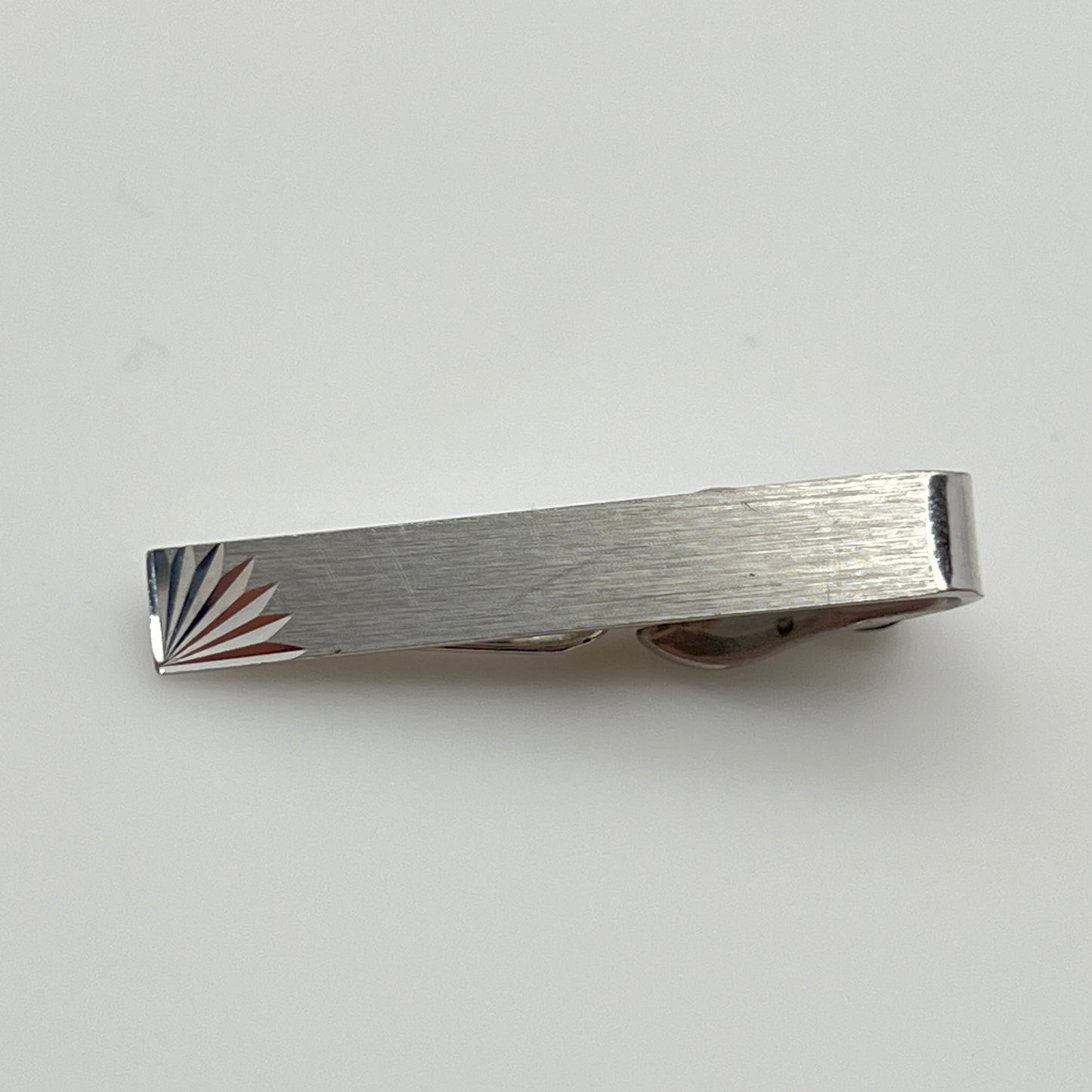 Brushed silver-tone Swank tie clip with etched fanburst detail, Mid-Century style