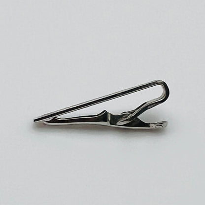 Brushed silver-tone Swank tie clip with etched fanburst detail, Mid-Century style