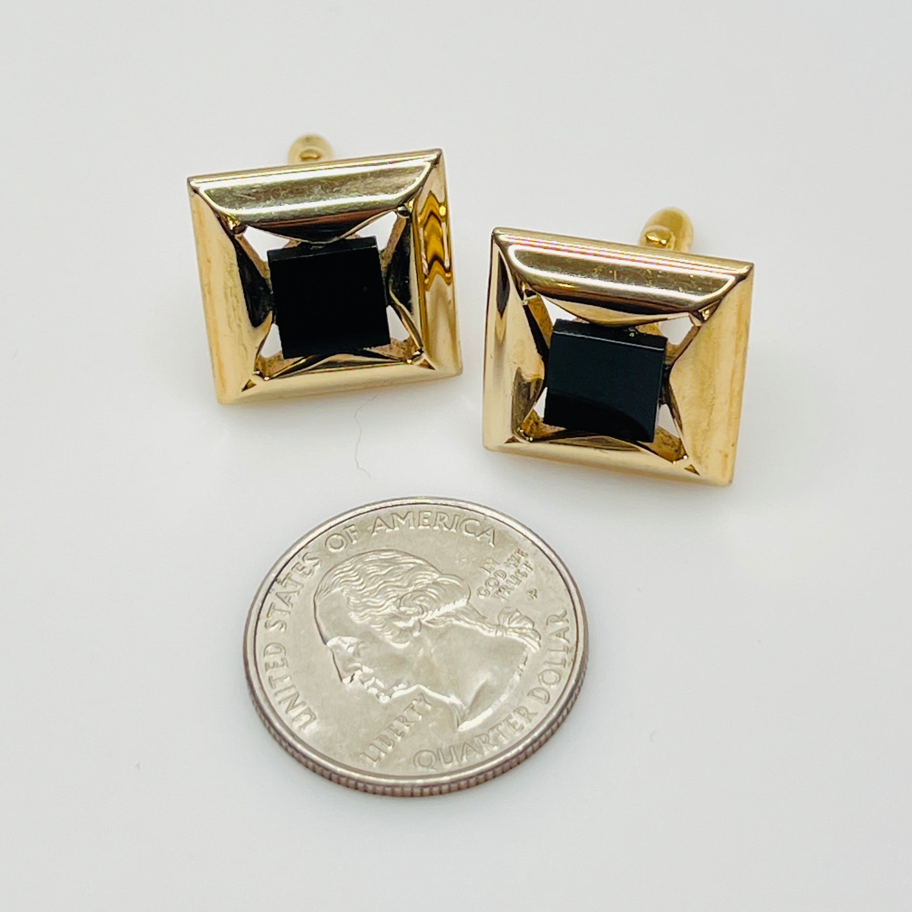 Gold-tone square cufflinks with black glass center, 1960s Mid-Century Modern style