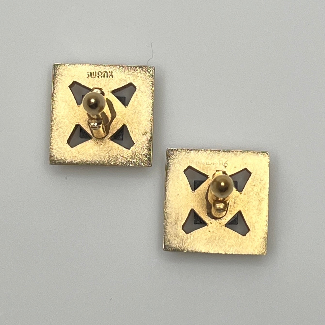 Gold-tone square cufflinks with black glass center, 1960s Mid-Century Modern style