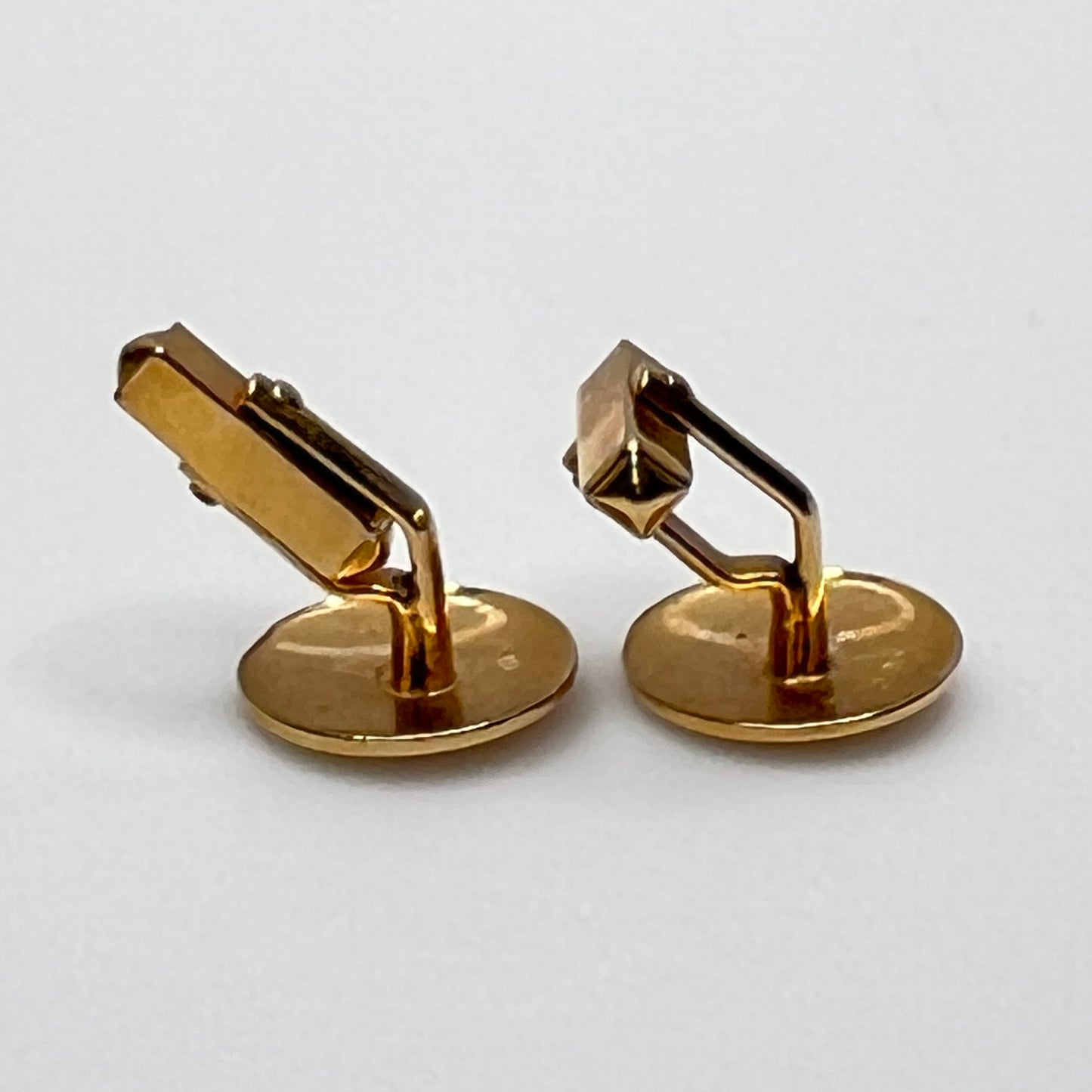 Pair of vintage goldtone Swank cufflinks with round engraved face