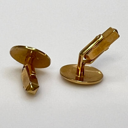 Pair of vintage goldtone Swank cufflinks with round engraved face