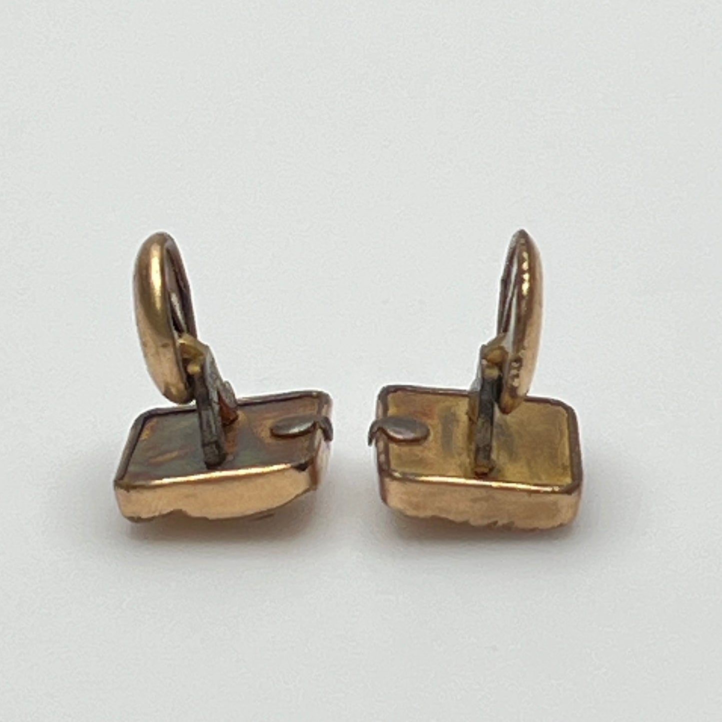 Antique rose gold-tone cufflinks with paste stone and scrollwork, stamped Pat Dec 1883