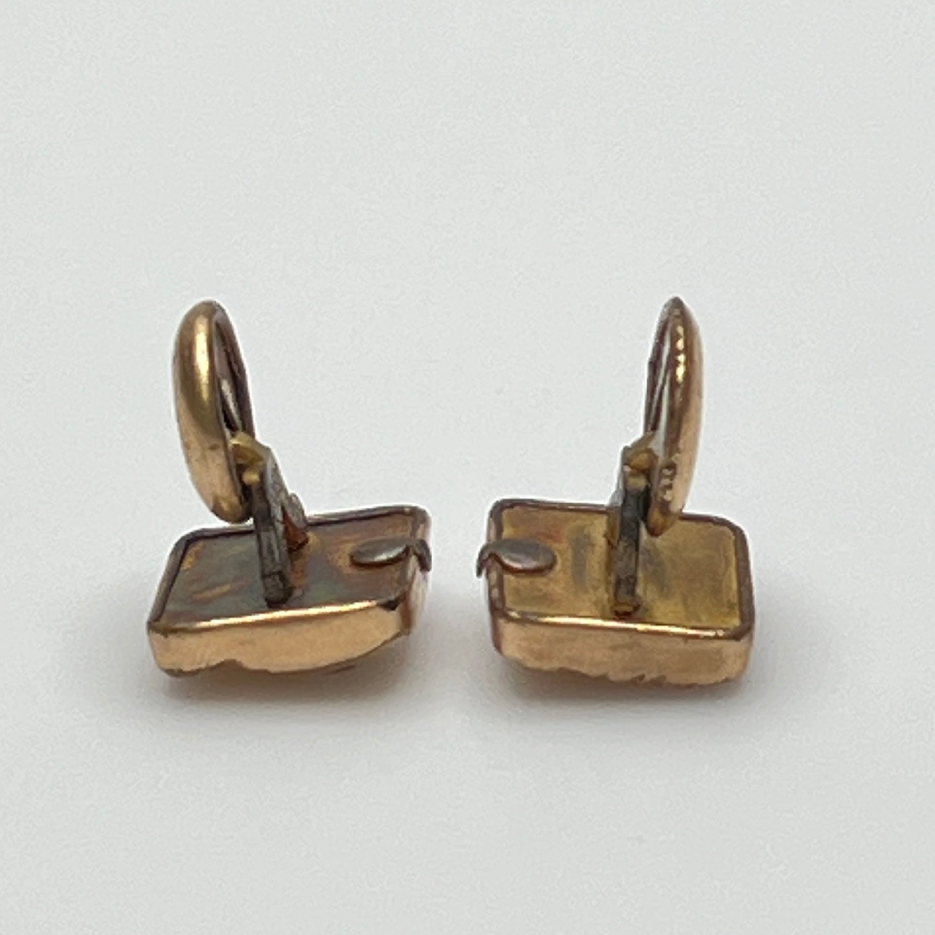 Antique rose gold-tone cufflinks with paste stone and scrollwork, stamped Pat Dec 1883