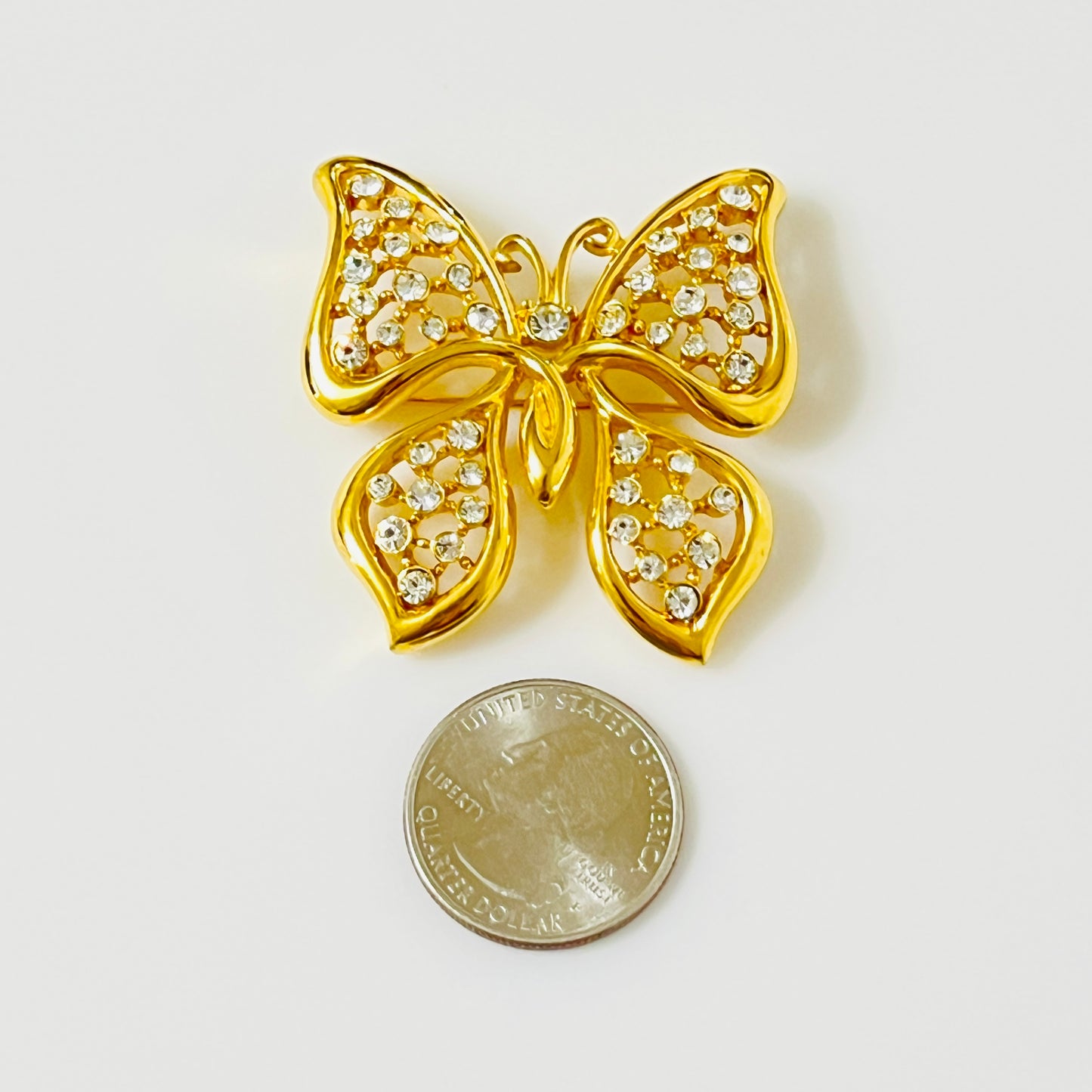 Vintage Monet gold tone rhinestone butterfly brooch