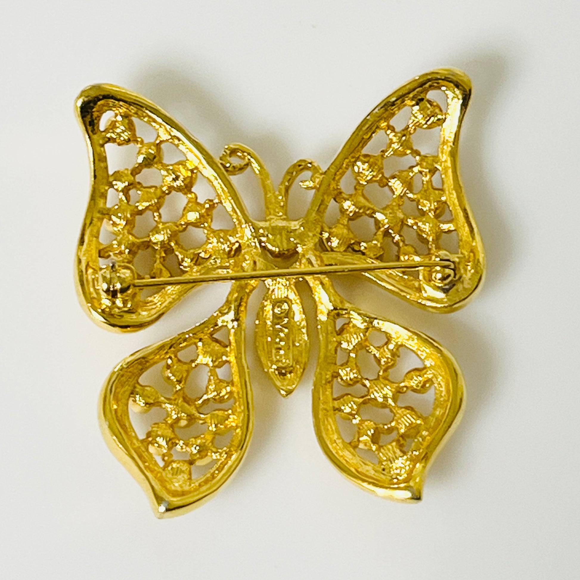 Gold butterfly brooch signed Monet vintage jewelry