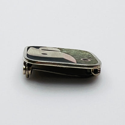 Side view of Taxco mixed metal artisan brooch
