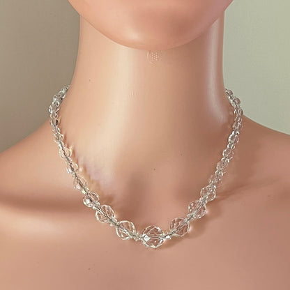 Mid-century crystal necklace displayed on mannequin bust
